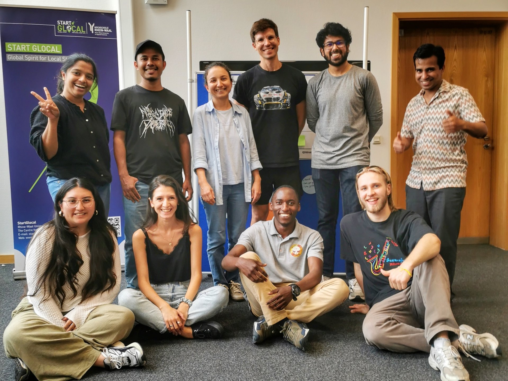 10 participants at the startup school pose for a group picture